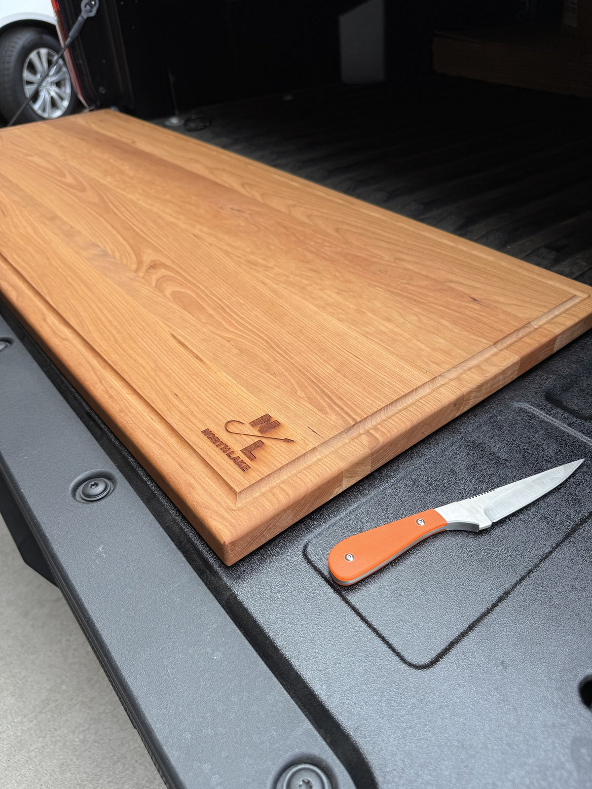 XL Wood Juice Groove top-down detail with knife — new photo